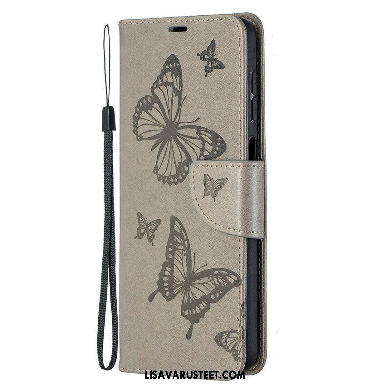 Flip Case Samsung Galaxy M12 / A12 Perhosia Lennossa Lanyardin Kanssa